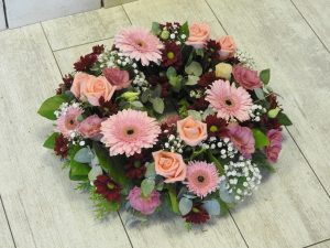 funeral flowers wreath pinks